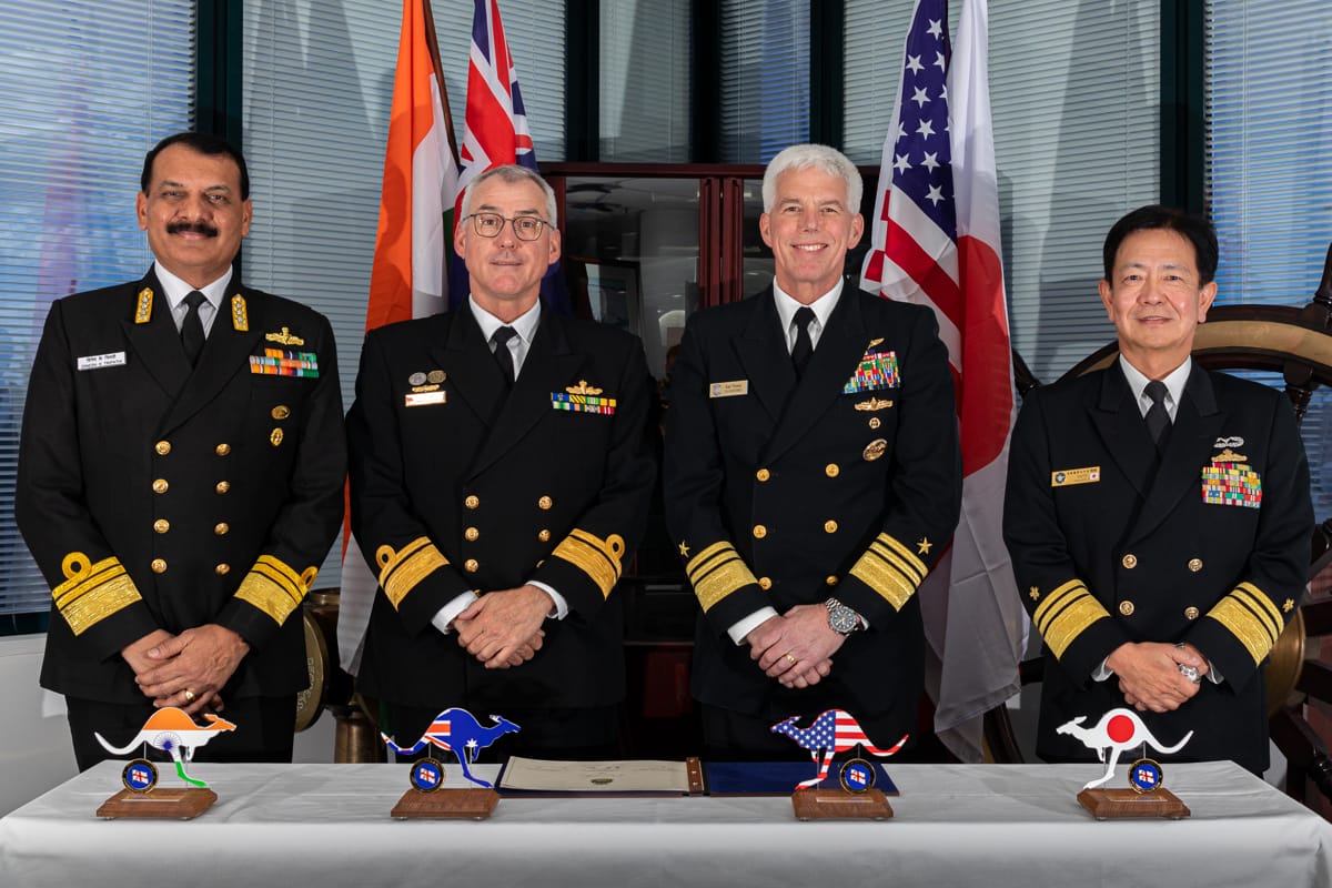 Naval commanders from India, Australia, the United States and Japan attend the official guest book signing during a visit to Fleet Headquarters at HMAS Kuttabul, NSW, 10 August (Benjamin Ricketts/Defence Department)