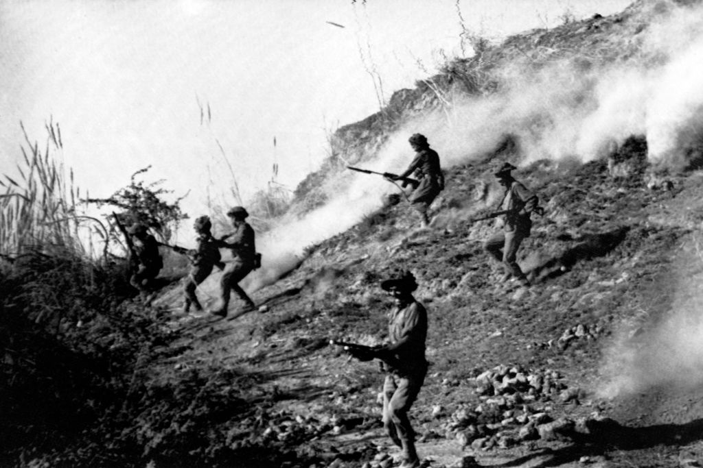 Indian army soldiers attacking Naya Chor, Sind, in support of Bengali rebels during the 1971 war (AFP via Getty Images)