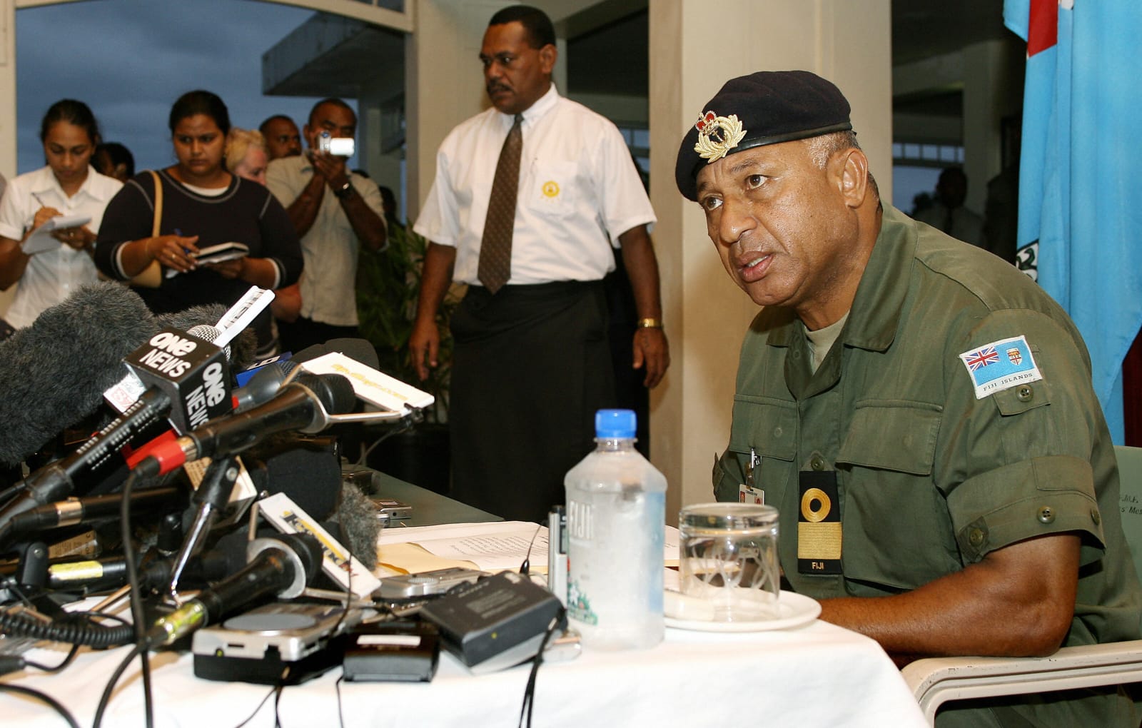 Bainimarama speaks at a press conference in December 2006 after overthrowing the Qarase government (William West/AFP via Getty Images)