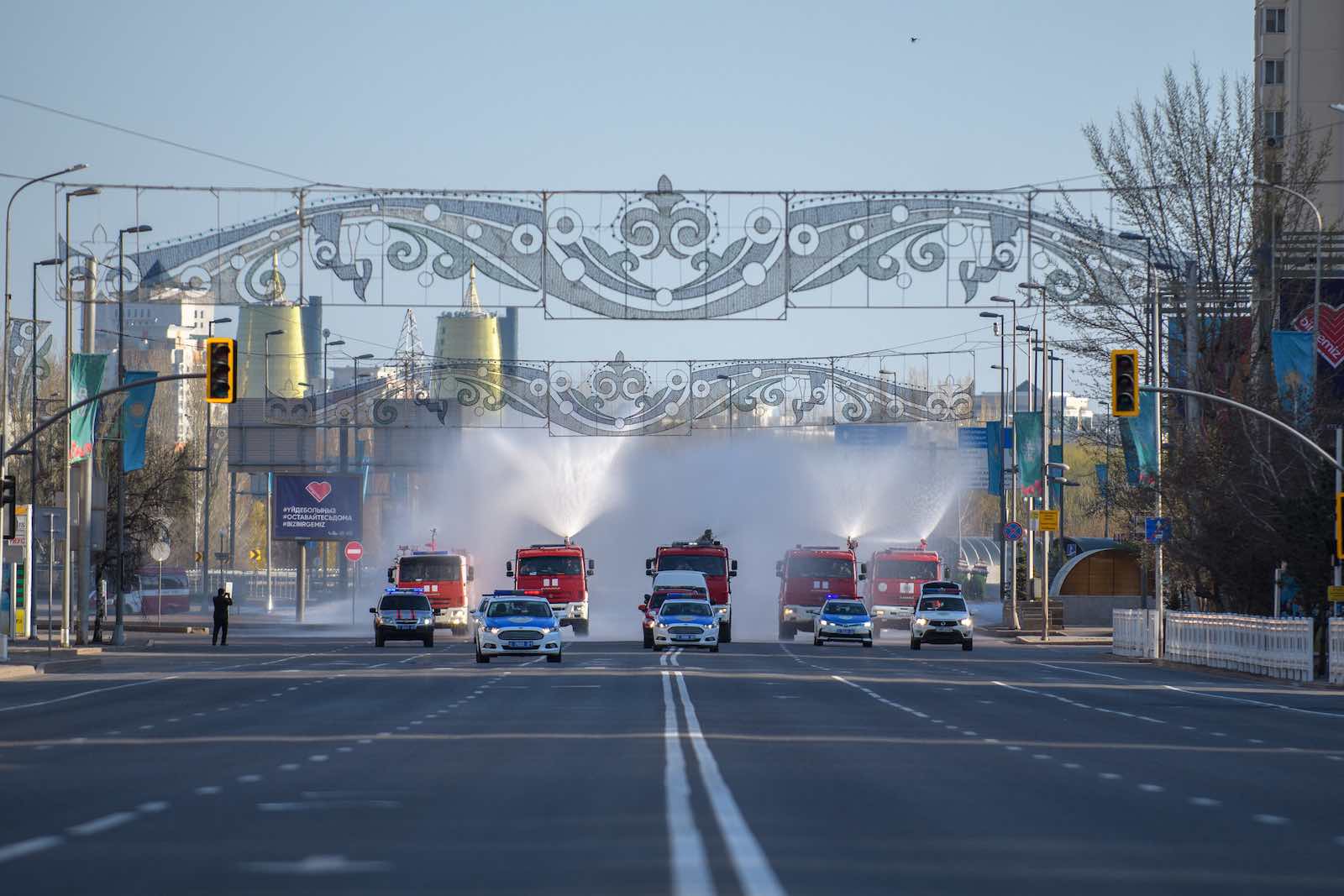The fire service sprays disinfectant in Nur-Sultan, Kazakhstan last month during the Covid-19 lockdown (Turar Kazangapov/Asian Development Bank/Flickr)