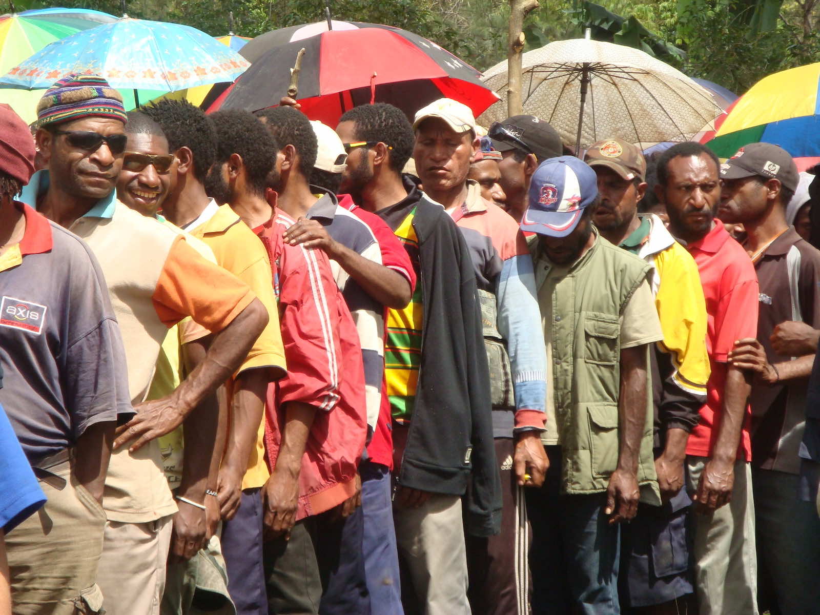 Men queue to vote in the highlands of Papua New Guinea during the 2012 election (Treva Braun/Commonwealth Secretariat/Flickr)