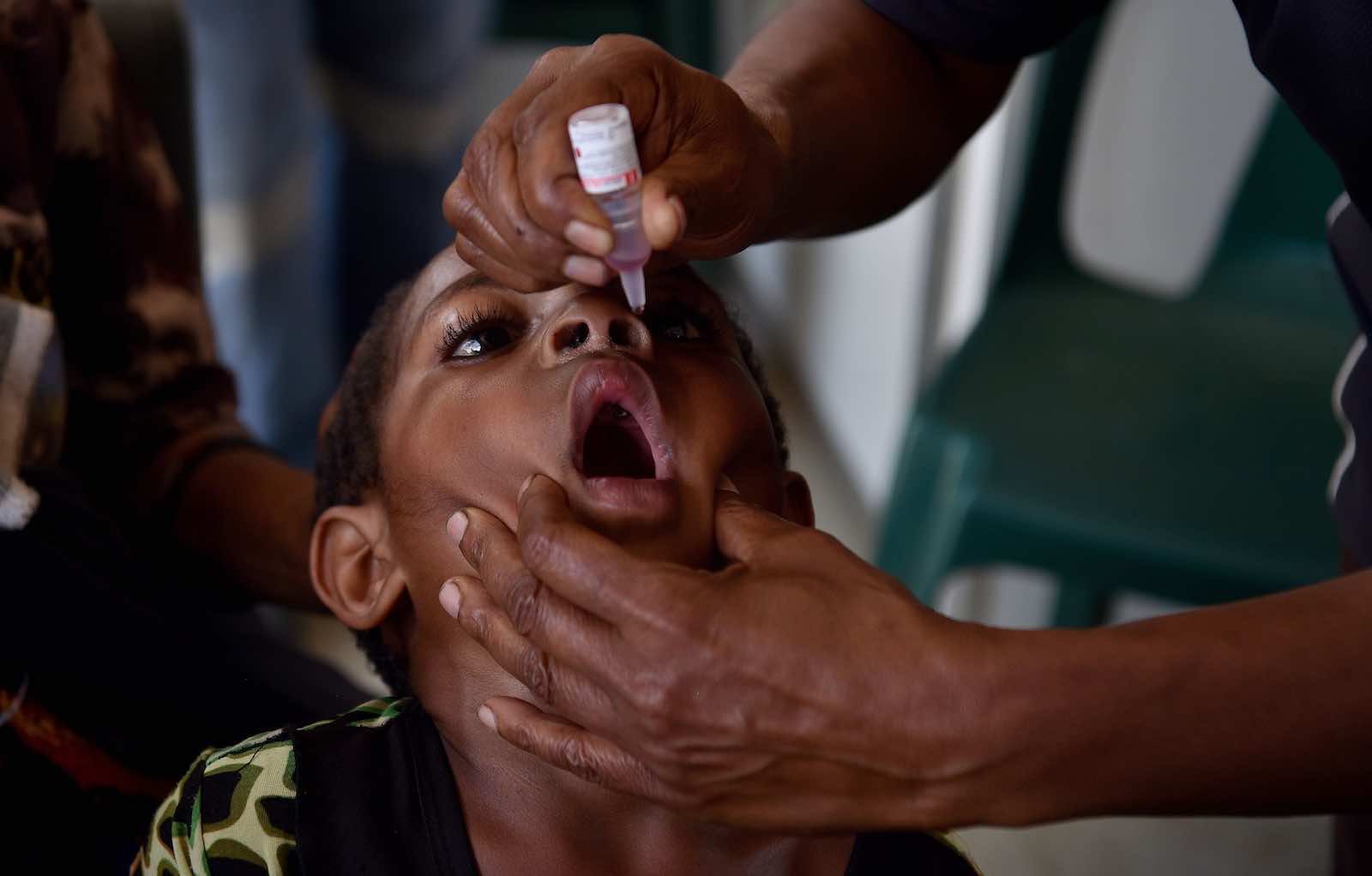 Administering a polio vaccination in PNG (Peter Parks/AFP/Getty Images)