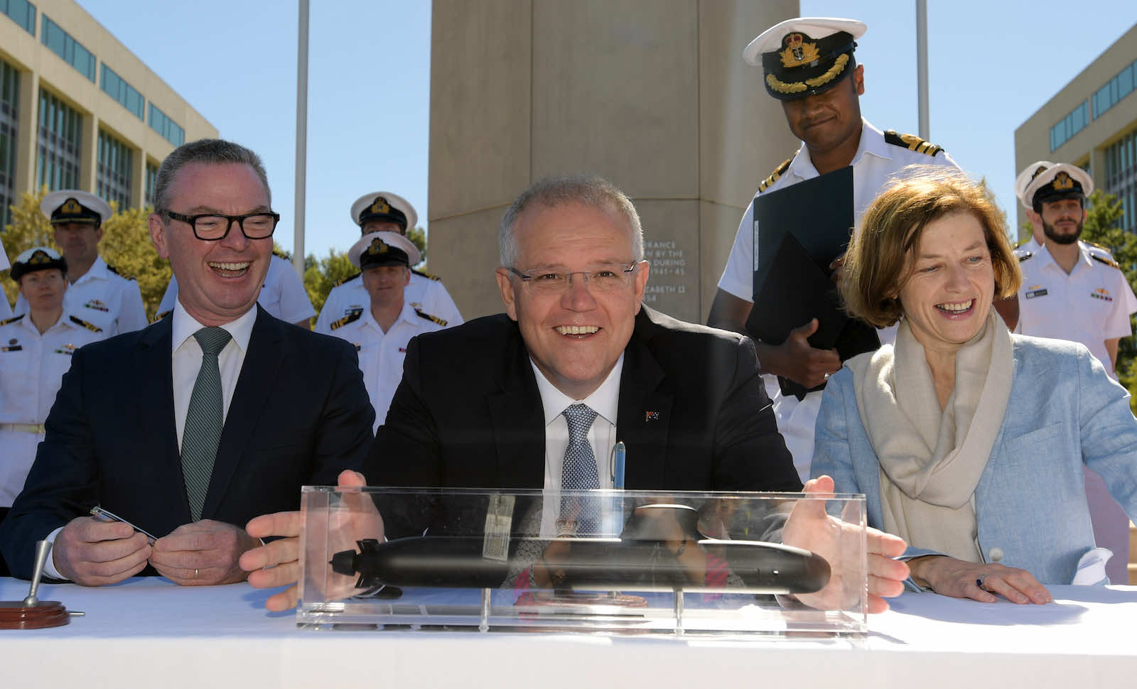 Prime Minister Scott Morrison, centre, signing a Strategic Partnership Agreement with France to build Attack-class submarines in February 2019 (Tracey Nearmy/Getty Images)