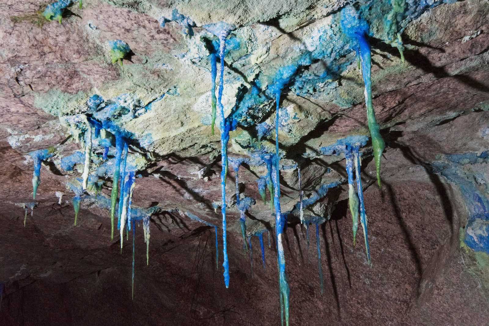 Copper shows on stalactites in a rare-earth mine (Photo: Rodger Bosch/AFP/Getty)