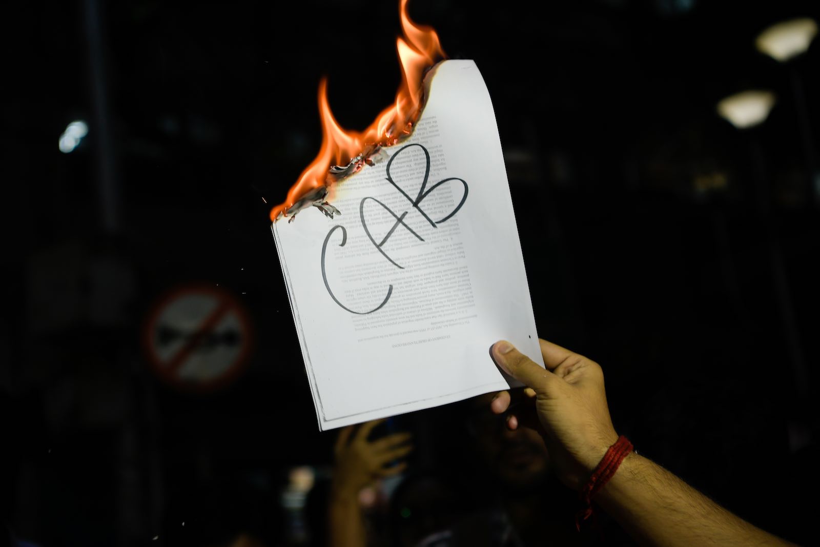 A replica of the citizenship bill is burnt during a weekend demonstration in Kolkata (Photo: Avijit Ghosh via Getty)