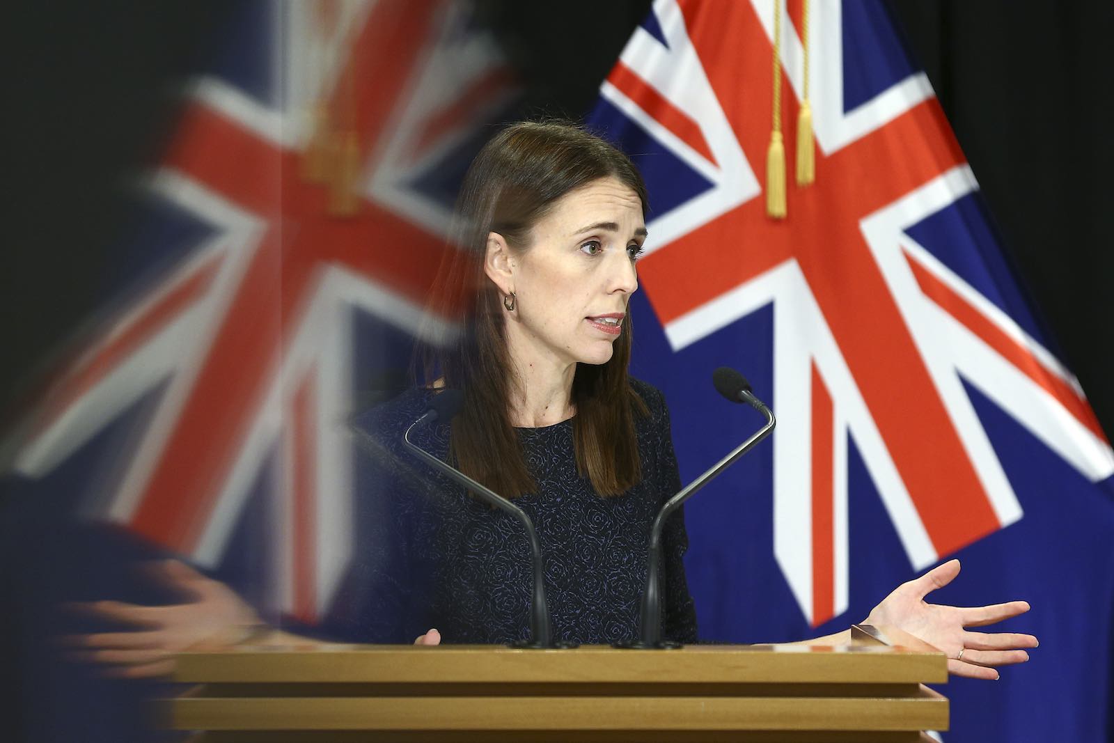 New Zealand Prime Minister Jacinda Ardern in a press conference on Tuesday to discuss a national lockdown (Hagen Hopkins/Getty Images)
