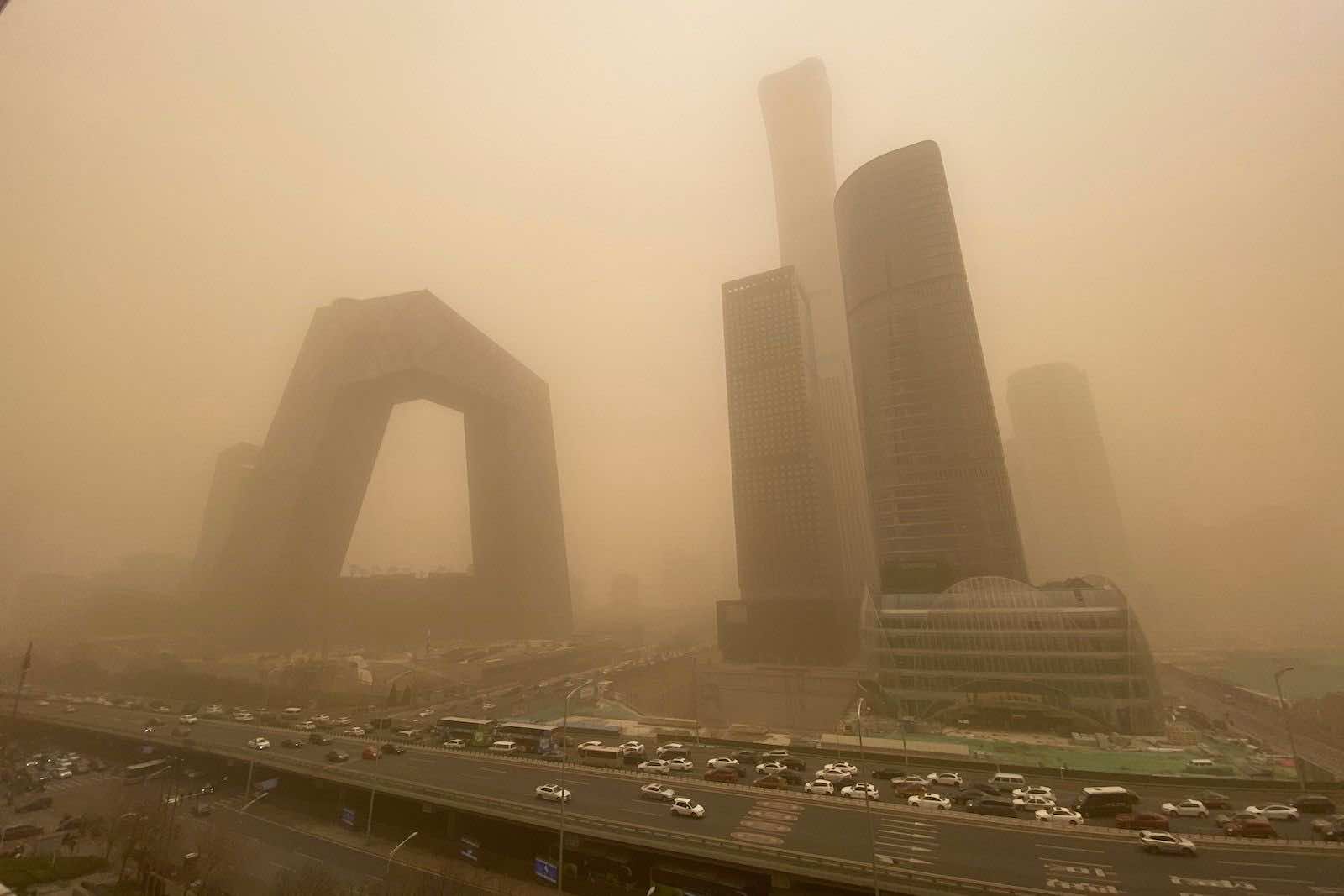 The central business district of Beijing during a sandstorm on 15 March 2021 (Leo Ramirez/AFP via Getty Images)