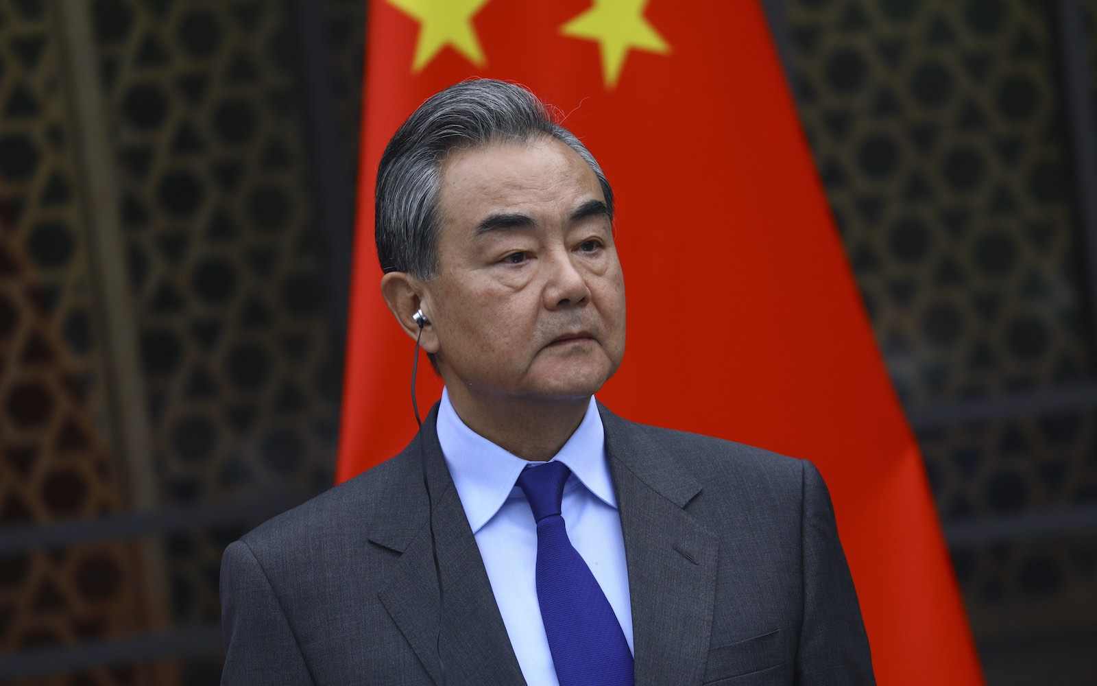 China’s Foreign Minister Wang Yi at a joint press conference with Russia’s FM Sergey Lavrov, Beijing, 23 March (Russian Foreign Ministry Press Service/Handout/Anadolu Agency via Getty Images)