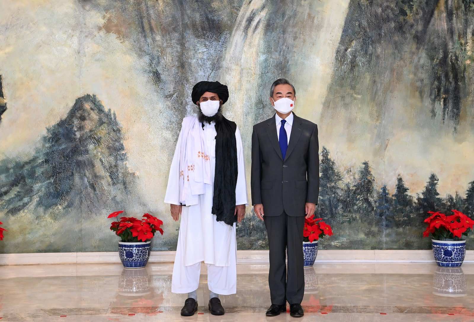 China’s Foreign Minister Wang Yi meets with Taliban political chief Mullah Abdul Ghani Baradar in Tianjin, 28 July (Li Ran/Xinhua via Getty Images)