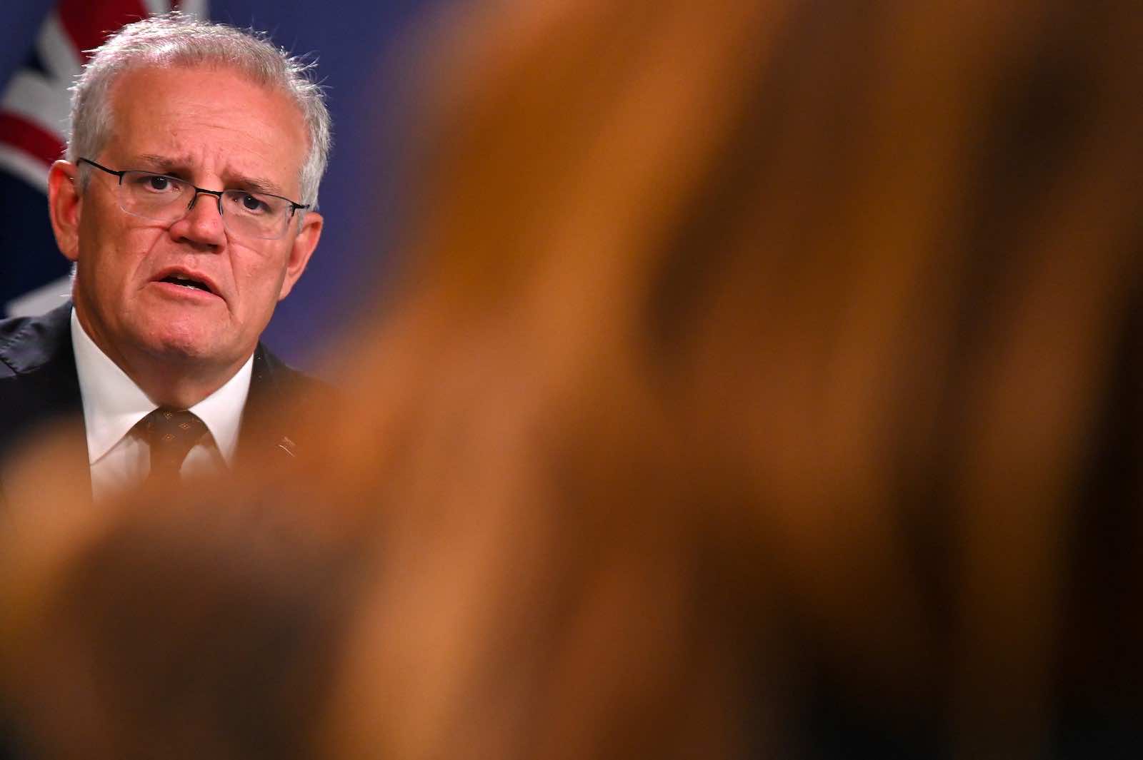As Australia recovered from bushfires amid the new pandemic, the Morrison government was an apparent true believer in what would become Bidenesque rhetoric (Steven Saphore/AFP via Getty Images)