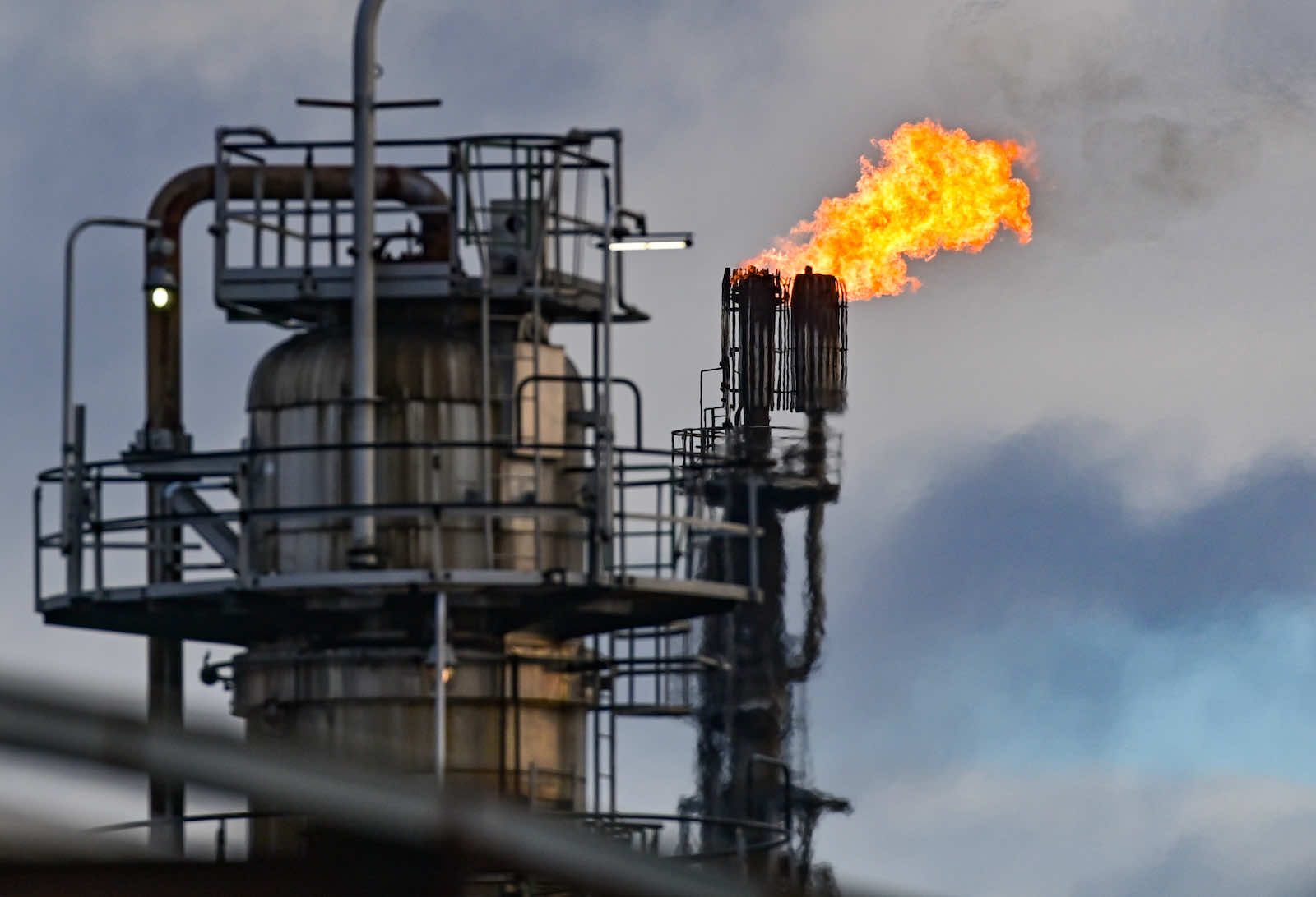Excess gas is burned at an oil refinery in Brandenburg, part of the “Friendship” pipeline from Russia to Germany (Patrick Pleul via Getty Images)