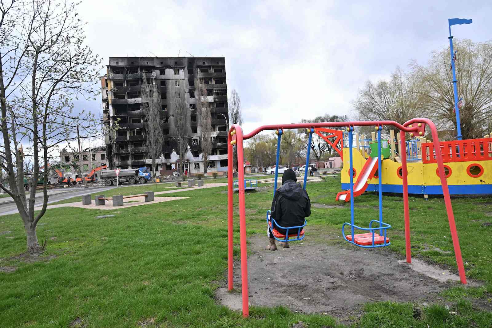 A playground opposite an apartment block destroyed in a bombardment in the Ukrainian town of Borodianka (Sergei Supinsky/AFP via Getty Images)