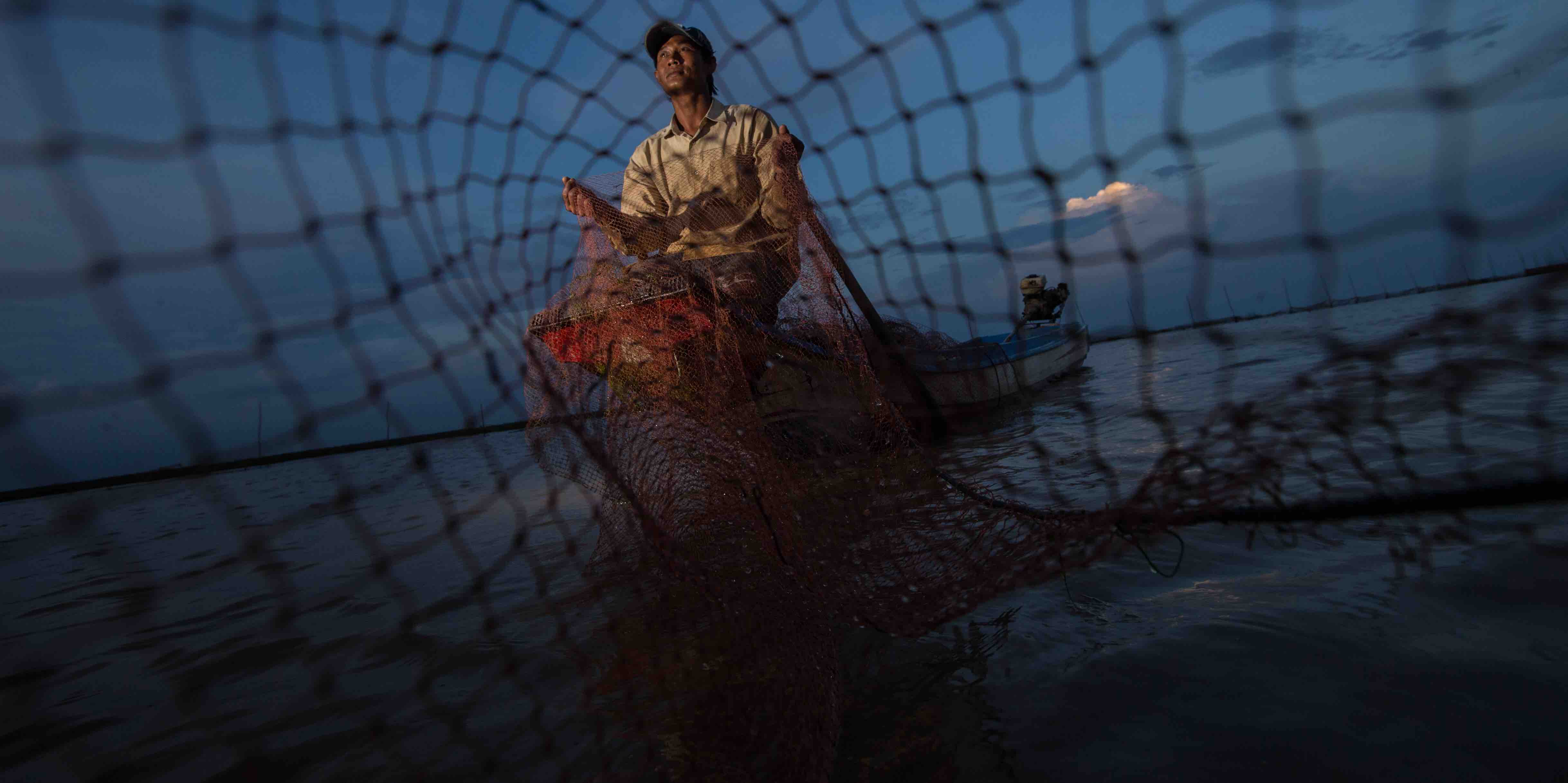 A fisherman on Tonle Sap Lake, Cambodia (Photo: Jason South/Fairfax via Getty)