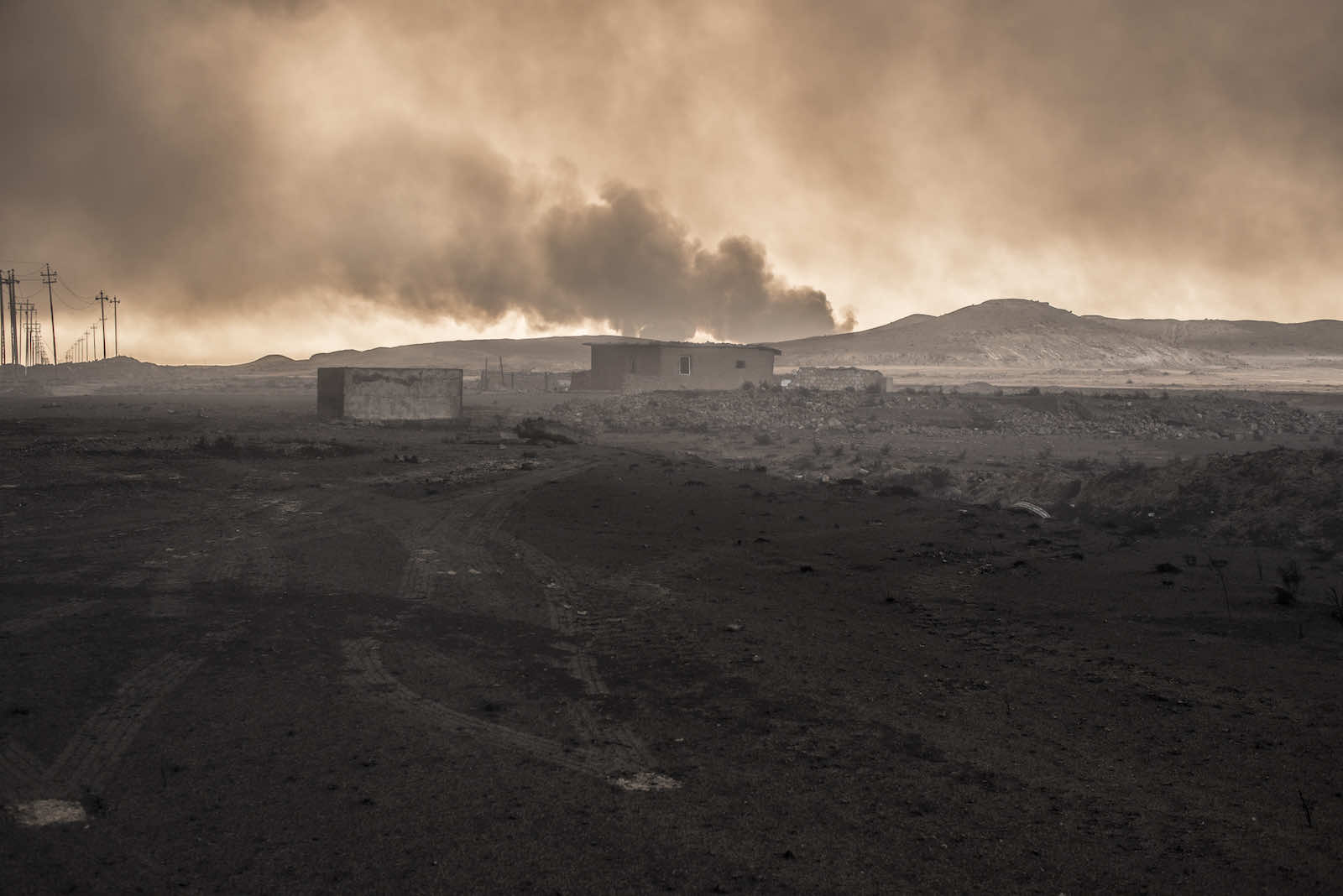 What might the future hold? Northern Iraq, 2016, when smoke filled the air from burning oil wells set alight by the Islamic State (Martyn Aim/Corbis via Getty Images)