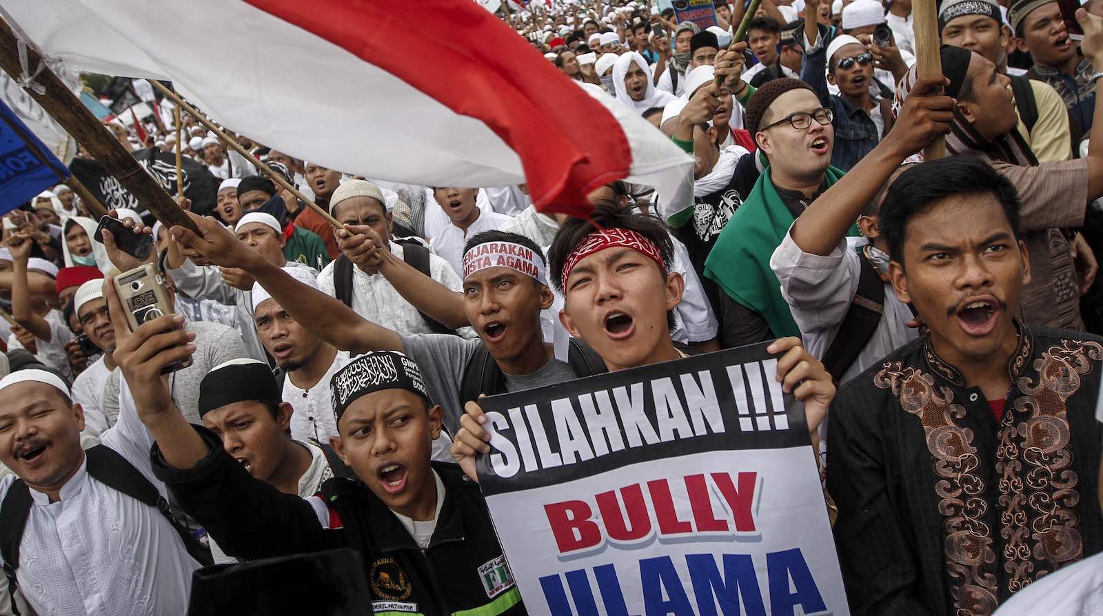 Protests in May 2017 against Jakarta's governor Basuki “Ahok” Purnama in the lead up to a blasphemy trial (Photo: Barcroft Media via Getty)