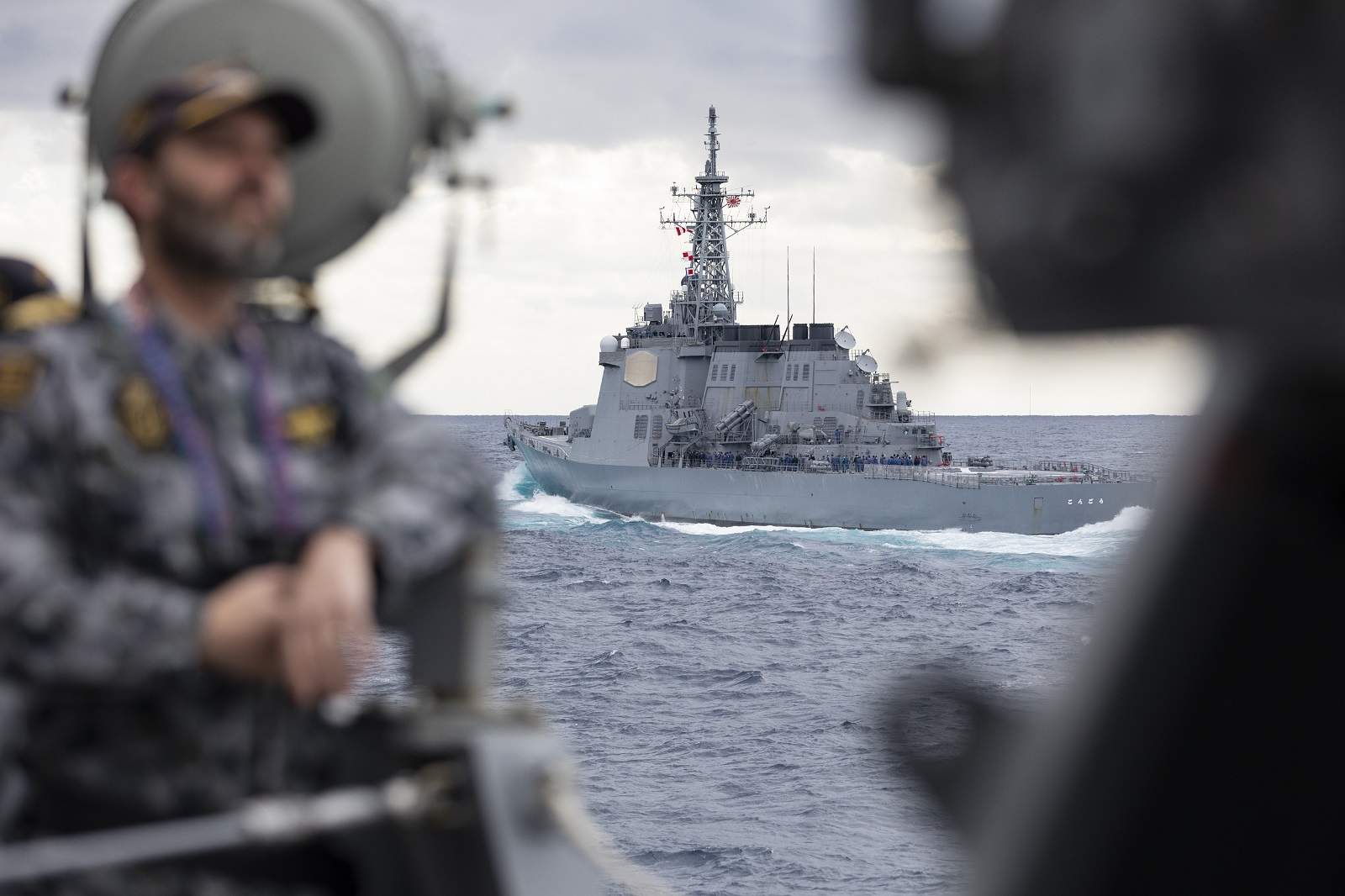 Onboard HMAS Brisbane during ANNUALEX 2021 with Japan Maritime Self Defence Force Ship JS Kirishima in the background (Defence.gov.au)