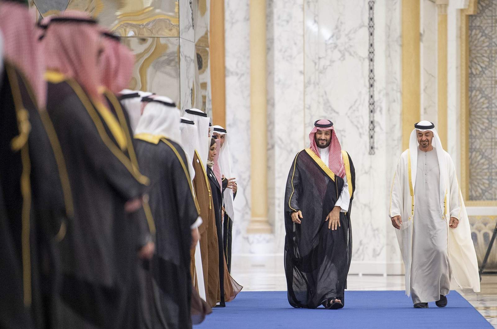 Crown Prince of Saudi Arabia Mohammad bin Salman al-Saud (L) is welcomed by National Security Advisor of United Arab Emirates Tahnoun bin Zayed Al Nahyan (R) in Abu Dhabi, UAE, 7 December 2021 (Royal Court of Saudi Arabia/Anadolu Agency via Getty Images)