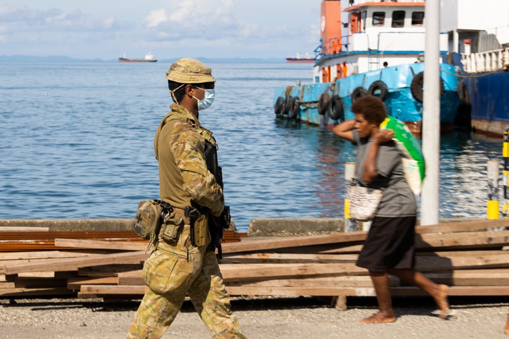 Australian troops patrol the Port of Honiara, Solomon Islands on 10 December 2021 (Defence Department)