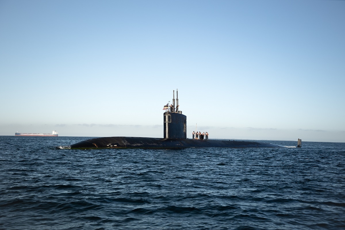 Title: AUKUS Announcement Keywords: Royal Australian NavyMinistersForeign ForcesAUKUS Photographer: POIS Craig Walton Related Imagery: S20230597 Caption: United States Submarine USS Ashville in Perth, Western Australia, following the international AUKUS announcement. Mid Caption: On 14 March 2023, the Government announced the first initiative under an enhanced trilateral security partnership with the United Kingdom and the United States (AUKUS) that will identify the optimal pathway for the acquisition of at least eight nuclear-powered submarines for the Royal Australian Navy. The Minister for Defence Personnel, the Hon. Matthew Keogh, along with U.S Rear Admiral Richard Seif, participated in a Sea Ride on board USS Ashville following the international AUKUS announcement.