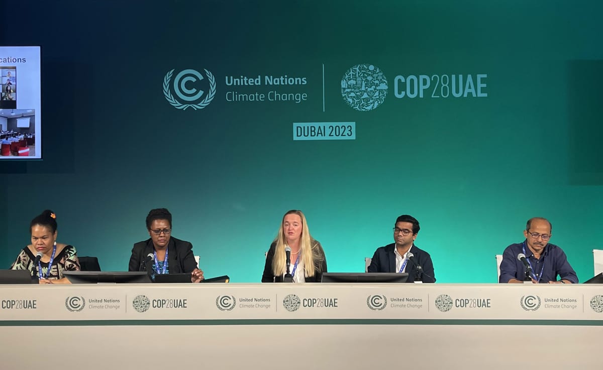 Lowy Institute Melanie Pill, centre, during a panel session at COP28 (Supplied)