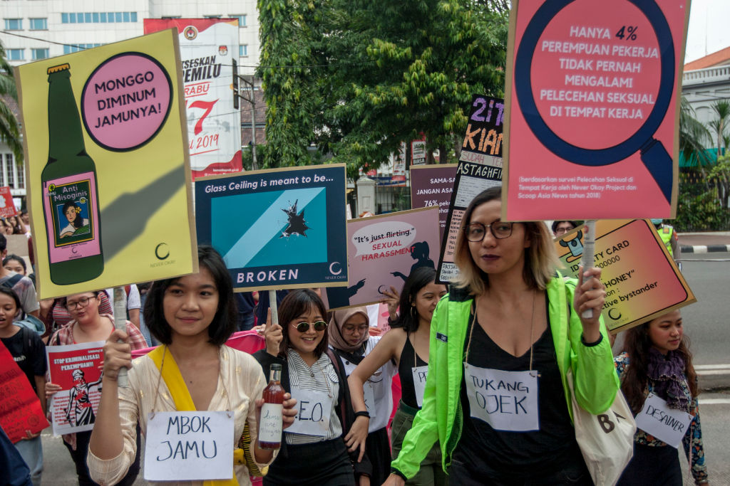 Protesters walk during the Women's March in Jakarta on the occasion of Kartini Day in 2019. (Mas Agung Wilis/NurPhoto via Getty Images)