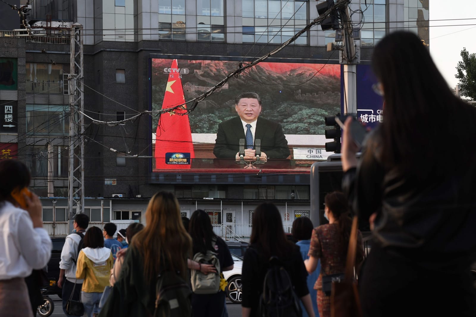 A street broadcast in Beijing of China’s Xi Jinping speaking via video link to the World Health Assembly in May 2020. Taiwan was not permitted to do so. (Greg Baker/AFP via Getty Images)