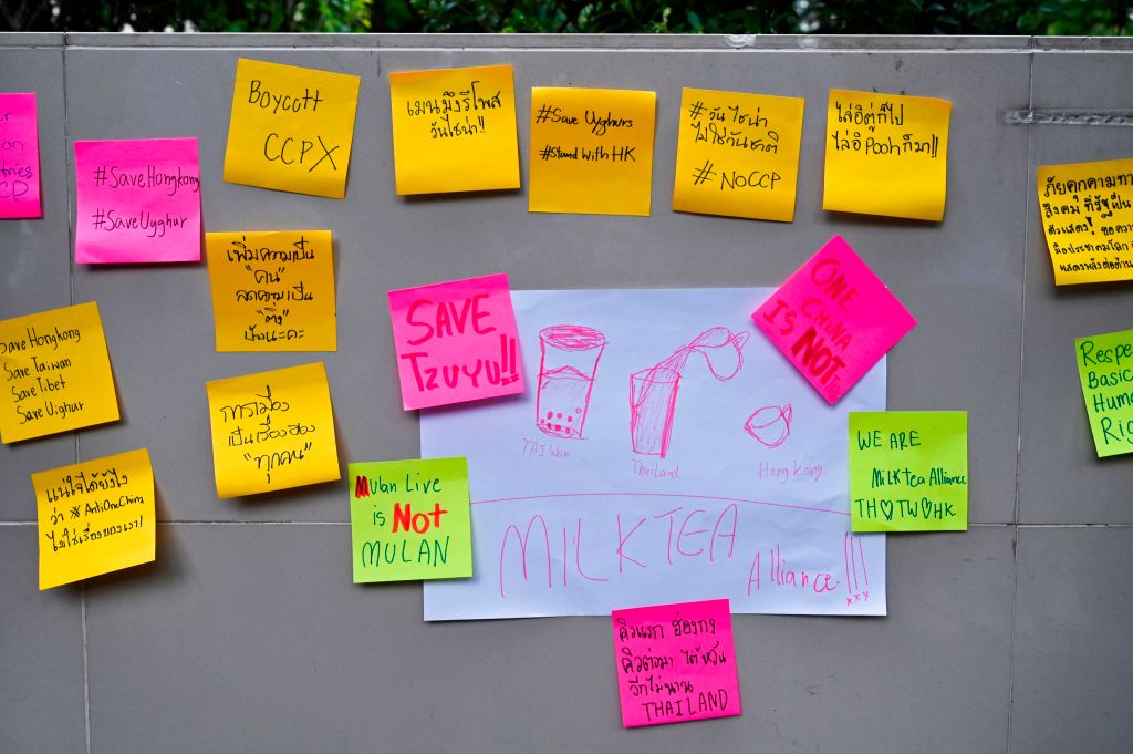 Sticker messages from Thai student demonstrators  in 2020 illustrate the broad campaign of the Milk Tea Alliance, which has shown regional solidarity with Taiwan (Photo by Romeo Gacad/AFP via Getty Images)