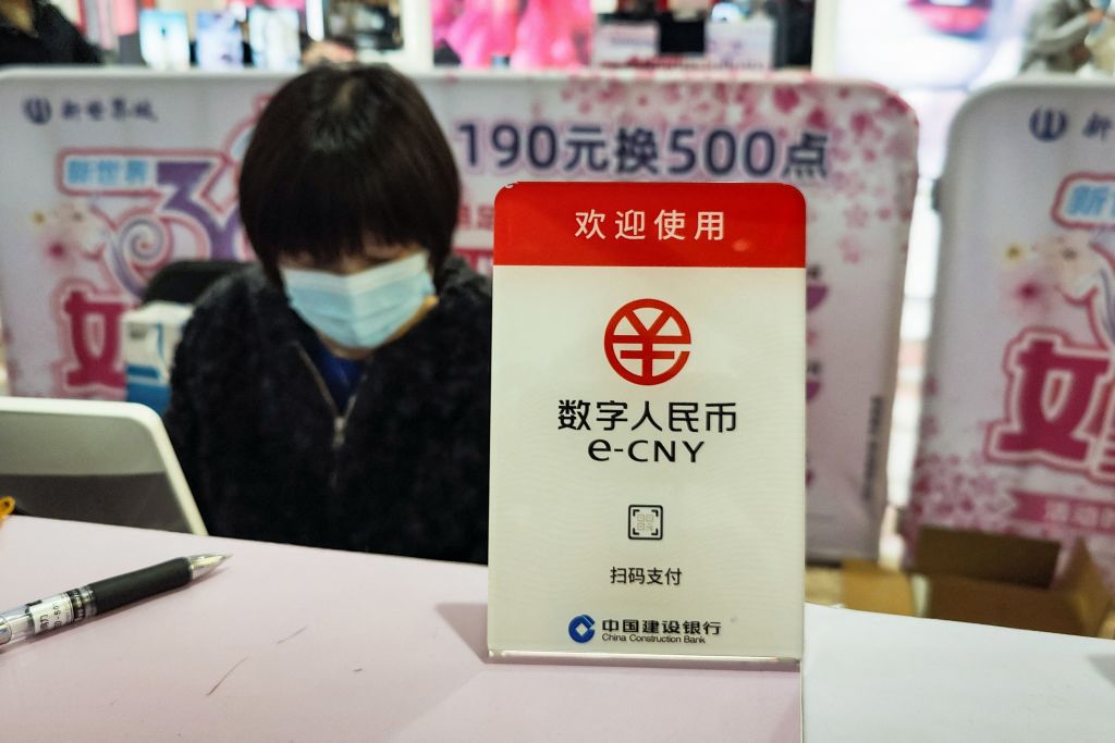 A sign for the electronic Chinese yuan - e-CNY - on display at a shopping mall in Shanghai (AFP via Getty Images)