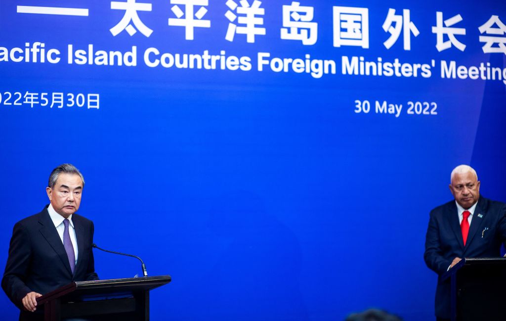 Chinese Foreign Minister Wang Yi (left) speaks during a joint press conference in May with Fijian Prime Minister Frank Bainimarama in Suva (Leon Lord/AFP via Getty Images)