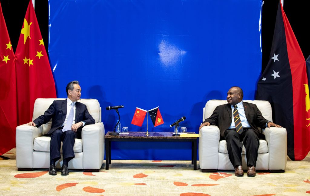 Wang Yi in Papua New Guinea meeting with Prime Minister James Marape on 3 June (Bai Xuefei/Xinhua via Getty Images)