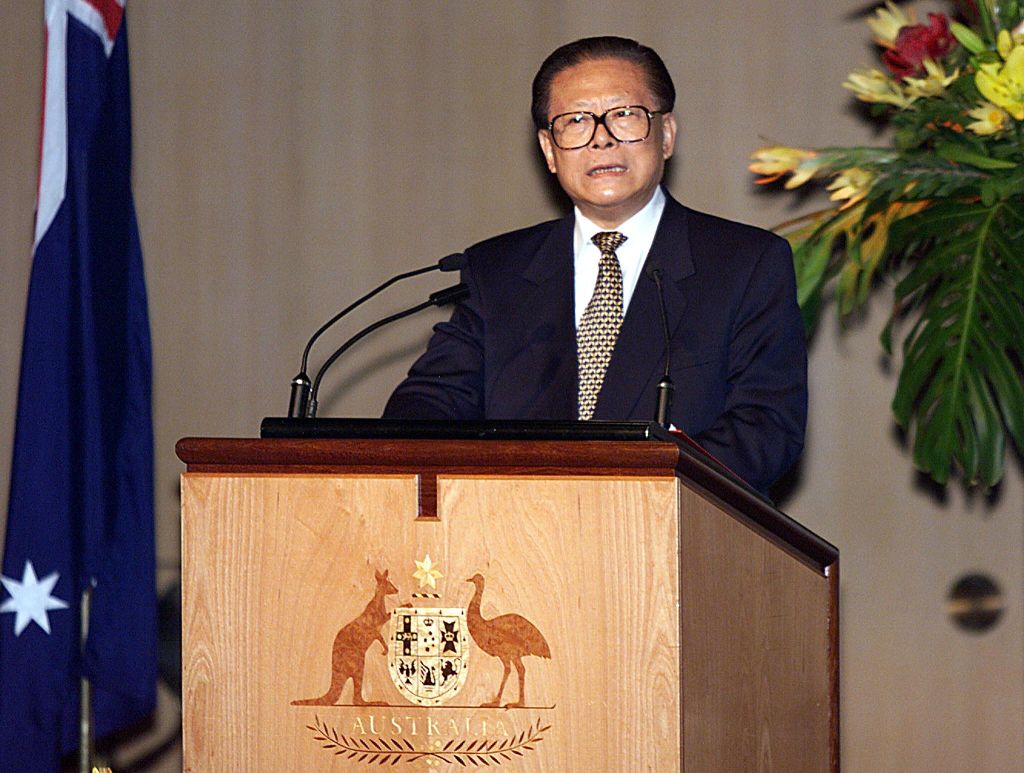 Jiang Zemin delivers a keynote address at Parliament House in Canberra in 1999 during the first ever visit by a Chinese head of state to Australia, promoting trade and investment (Torsten Blackwood/AFP via Getty Images)