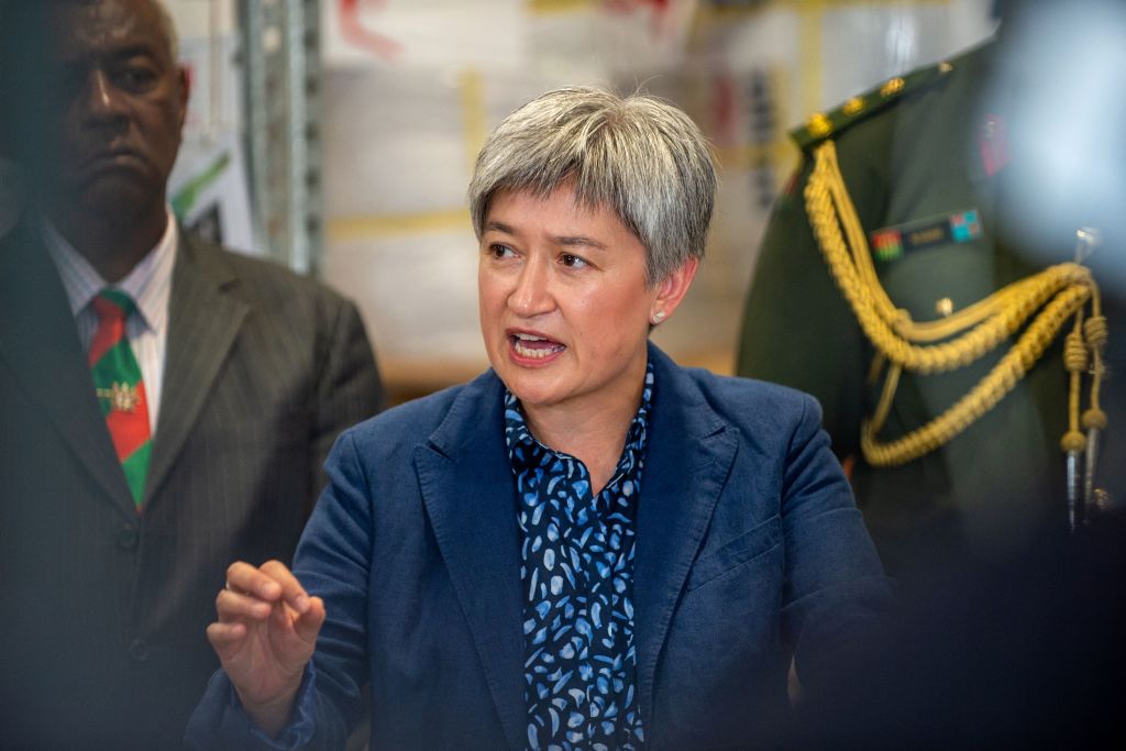 Foreign Minister Penny Wong speaks at a joint press conference with Fijian counterpart Pio Tikoduadua, left, during a visit to the Blackrock Peacekeeping and Humanitarian Assistance and Disaster Relief Camp in Nadi, Fiji, in February (Leon Lord/AFP via Getty Images)
