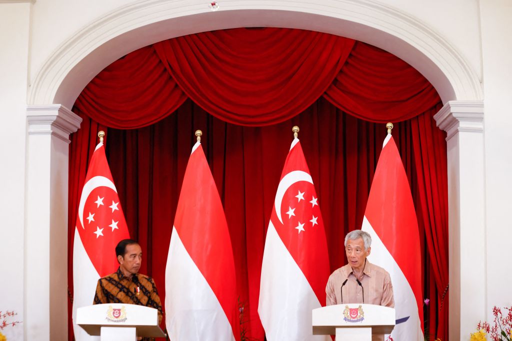 A pair of big names stepping off the scene: Indonesia’s Joko Widodo and Singapore’s Lee Hsien Loong (Edgar Su via AFP/Getty Images)