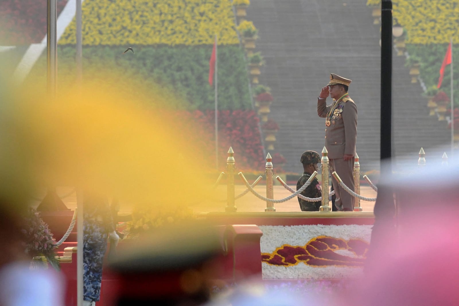 Myanmar Military Chief Senior General Min Aung Hlaing salutes during a ceremony to mark the country’s 78th Armed Forces Day in Naypyidaw last month (STR/AFP via Getty Images)