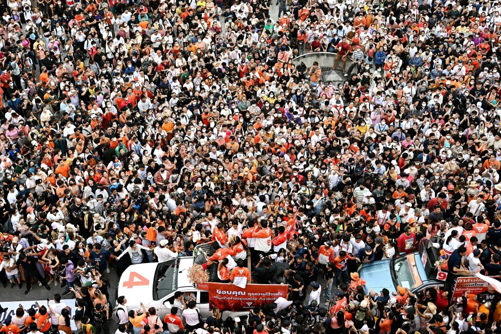 The crowd at a Move Forward Party victory parade in Bangkok on 15 May (Manan Vatsyayana/AFP via Getty Images)
