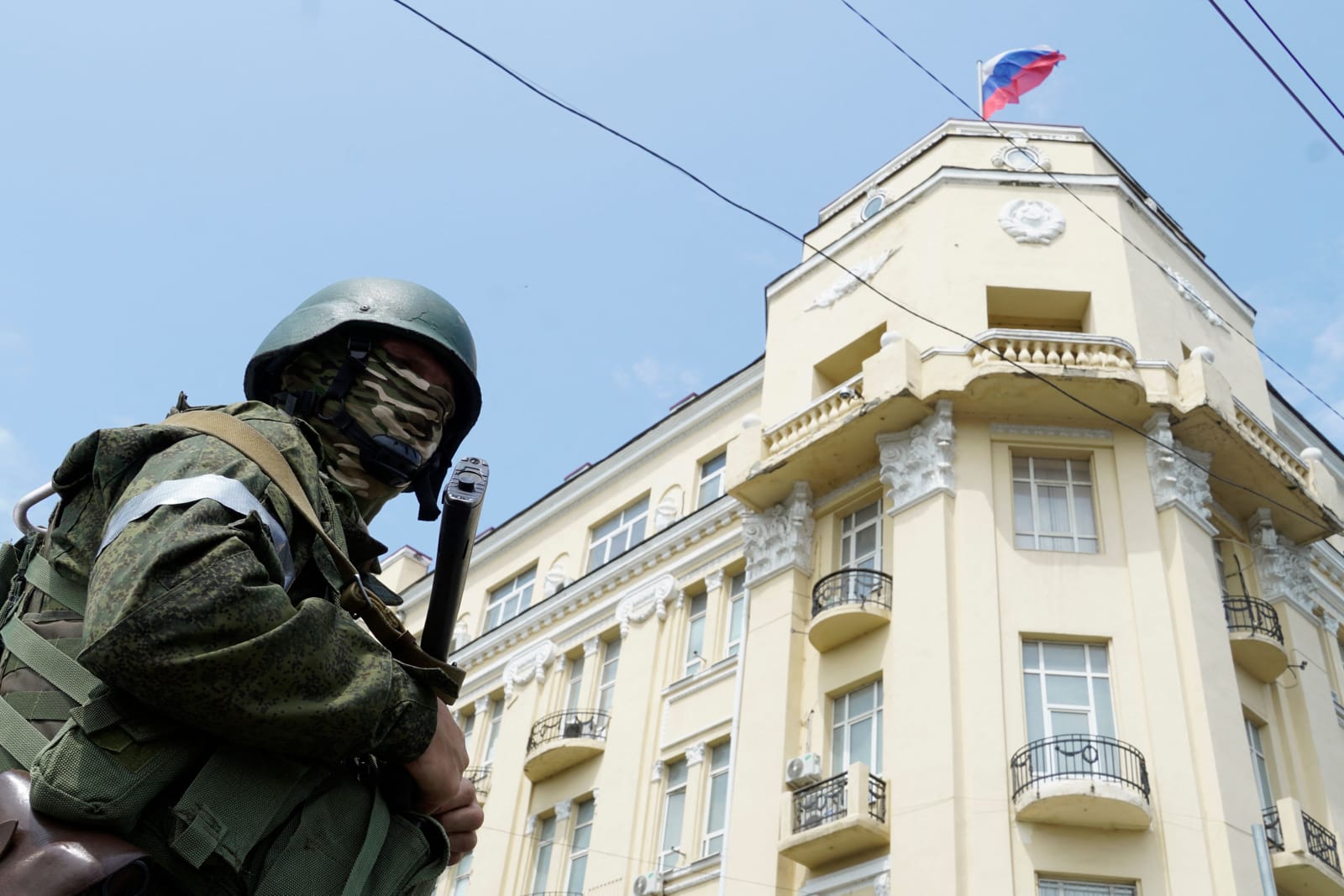 A member of Wagner group stands guard in a street in the city of Rostov-on-Don after taking control in the city on 24 June (AFP via Getty Images)