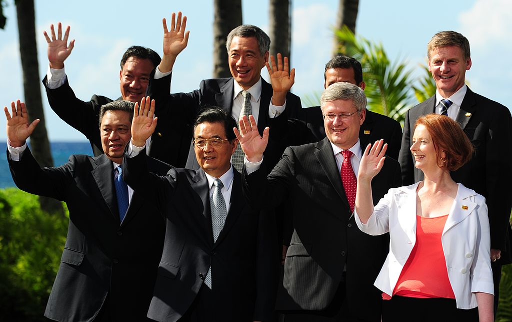 Australia’s Julia Gillard (bottom right) with Chinese President Hu Jintao (bottom, second left) and other Asia Pacific leaders at the 2011 APEC meeting (Robyn Beck/AFP via Getty Images)