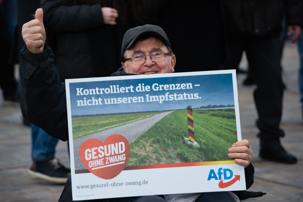 An AfD supporter in Germany at a rally against vaccinations (Craig Stennett/Getty Images)