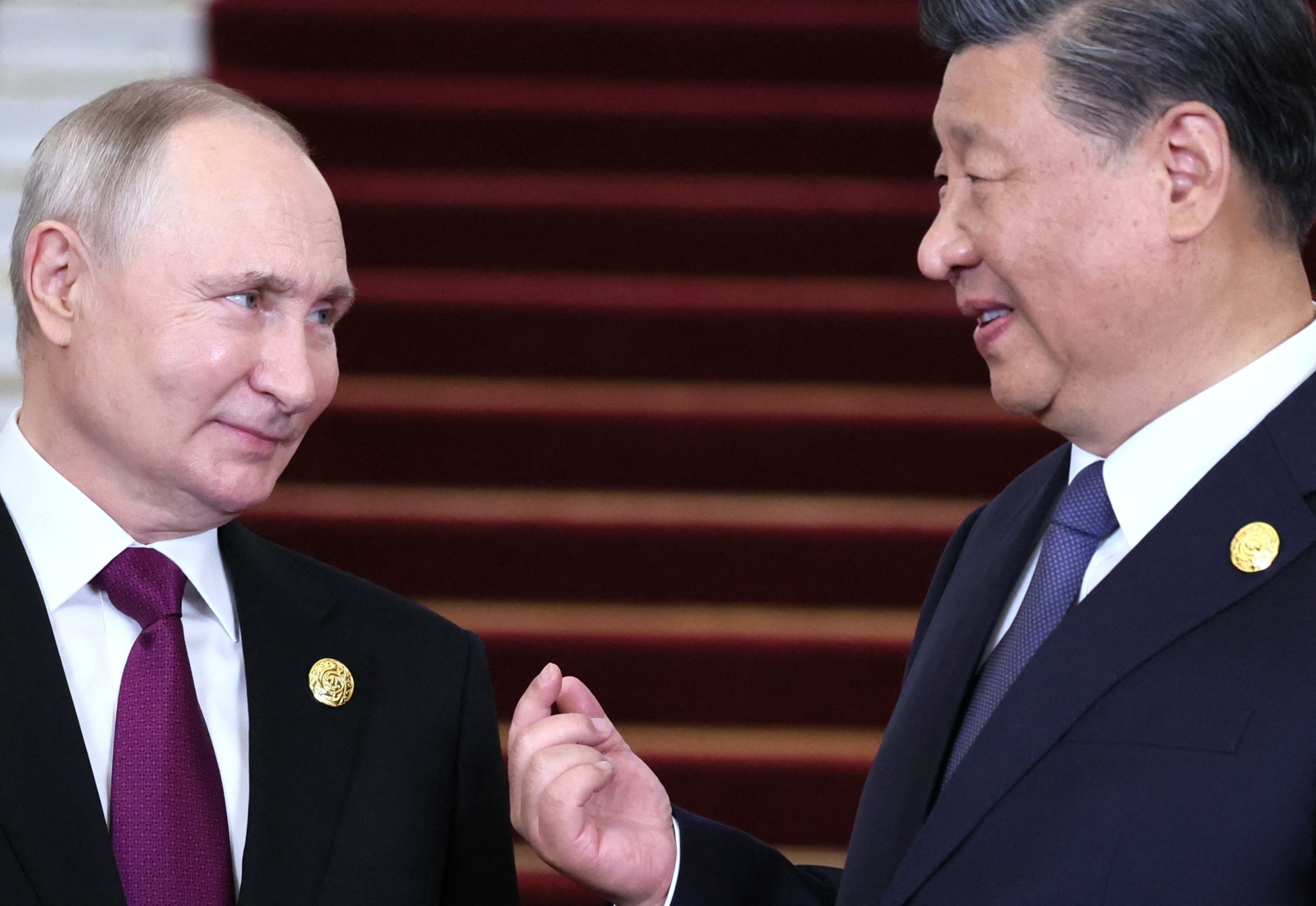 Russia's President Vladimir Putin and China's President Xi Jinping (Sergei Savostyanov/AFP via Getty Images)