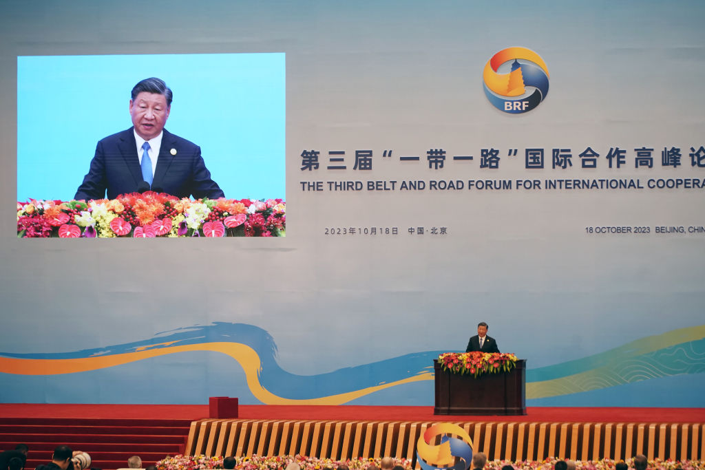 Xi Jinping, China's president, speaks during the opening ceremony at the Belt and Road Forum in Beijing, China, 18 October (Qilai Shen/Bloomberg via Getty Images)
