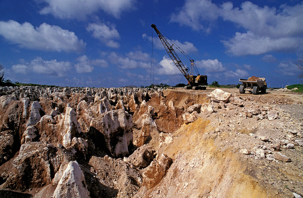 A phosphate mining site in Nauru, 1997, leaving a barren terrain of limestone pinnacles (Auscape/Universal Images Group via Getty Images)