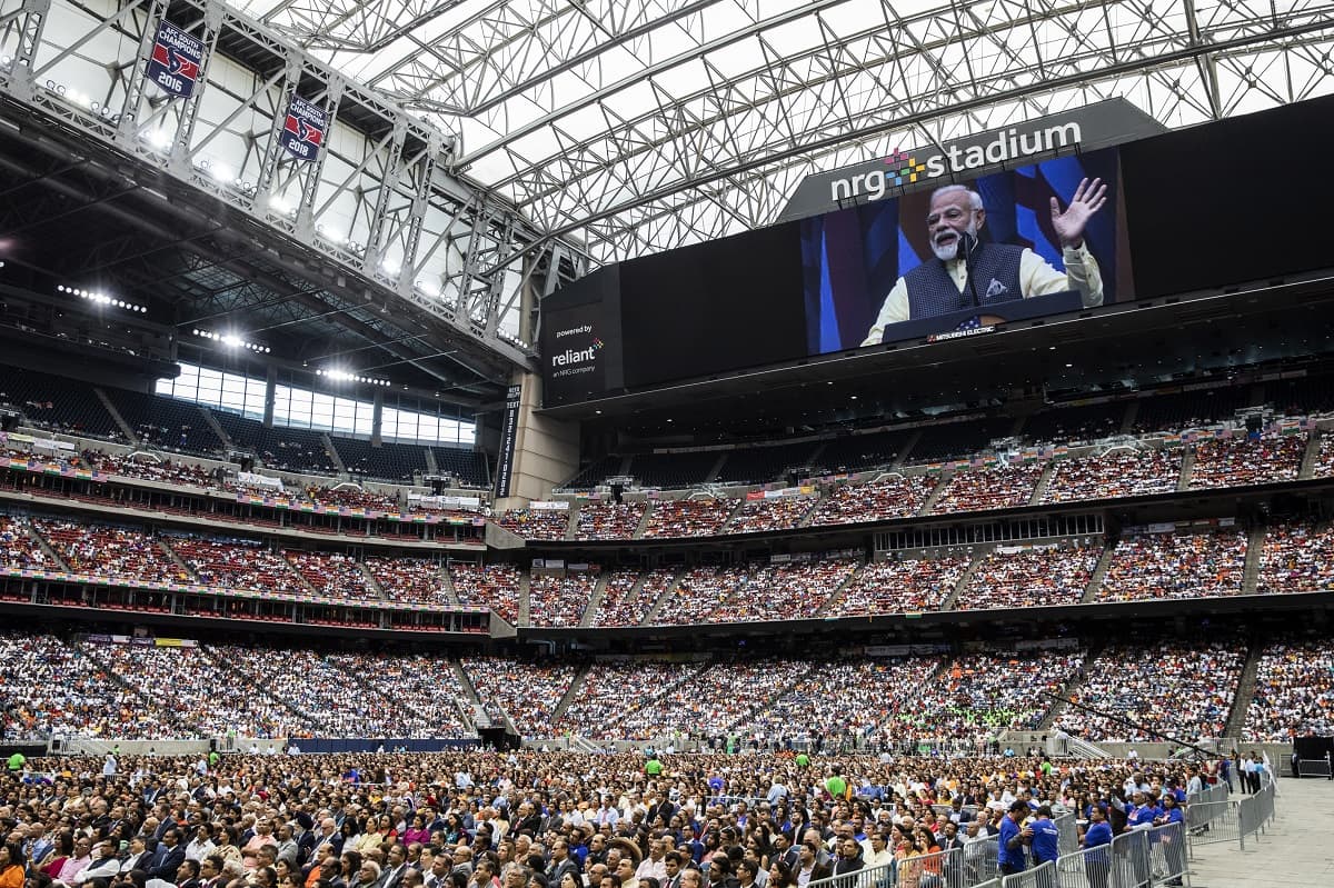 Narendra Modi, India's prime minister, is seen on the large screen as he speaks during the Howdy Modi Community Summit in Houston, Texas, U.S., on Sunday, Sept. 22, 2019. President Donald Trump received the endorsement of Modi as they shared a stage in Houston, walking hand in hand in a rock-star-like show to address more than 50,000 Indian Americans. Photographer: Scott Dalton/Bloomberg via Getty Images