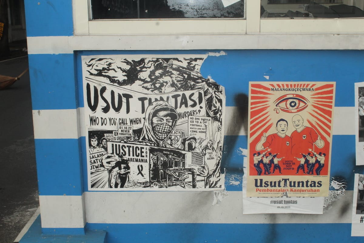 Posters on a police box in Malang calling for an investigation into police actions at Kanjuruahan Stadium on 1 October (Duncan Graham) 