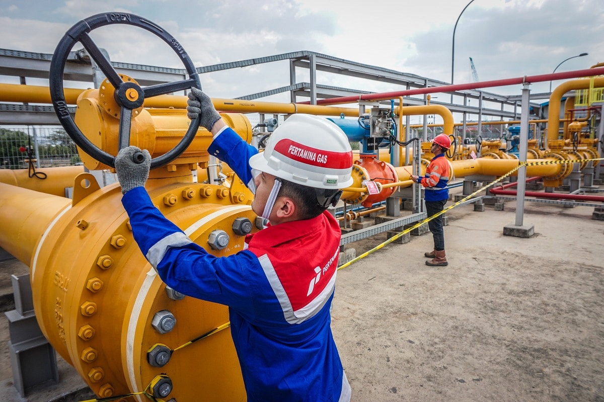 Employees inspect the installation of gas pipelines in the Onshore Receiving Facility (ORF) or PT Pertamina Gas (Pertagas) gas receiving facility in Tambaklorok, Semarang, Central Java on October 03, 2019. The gas receiving facility with a capacity of around 500 mmscfd is part of the 270 kilometer Gresik-Semarang gas transmission pipeline project, which is currently operating at 98 percent, and is targeted to operate in 2020 to meet energy needs in East and Central Java. (Photo by WF Sihardian/NurPhoto via Getty Images)