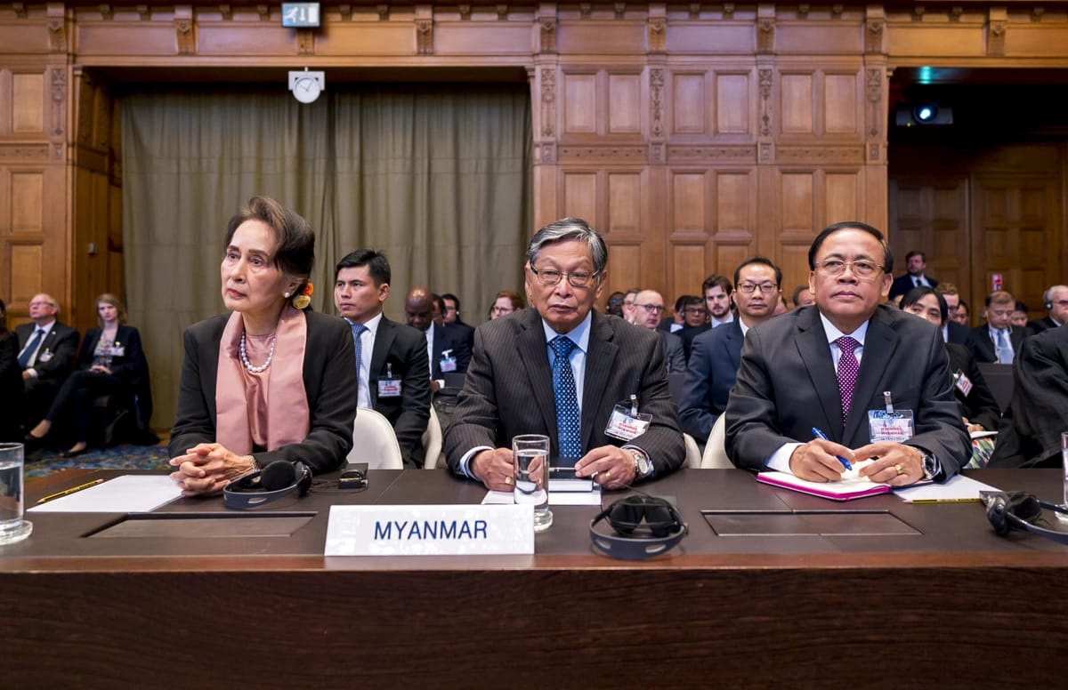 left, representing Myanmar, during 2019 proceedings at the International Court of Justice (ICJ)
