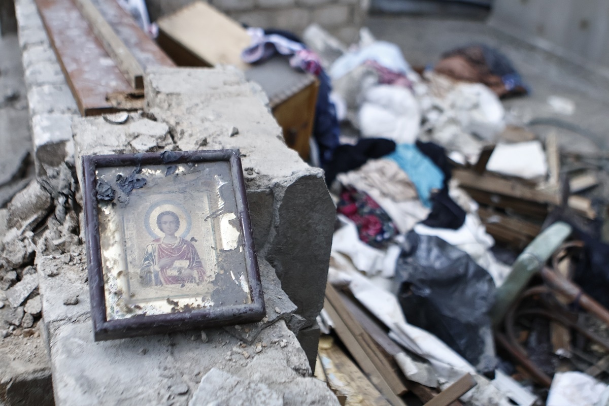 KHERSON, UKRAINE - JUNE 22: A religious icon lies in front of destroyed belongings after the flood waters receded on June 22, 2023 in Kherson, Ukraine. On June 6, the dam at the Kakhovka HPP controlled by Russian military was destroyed by explosion. (Photo by Yan Dobronosov/Global Images Ukraine via Getty Images)