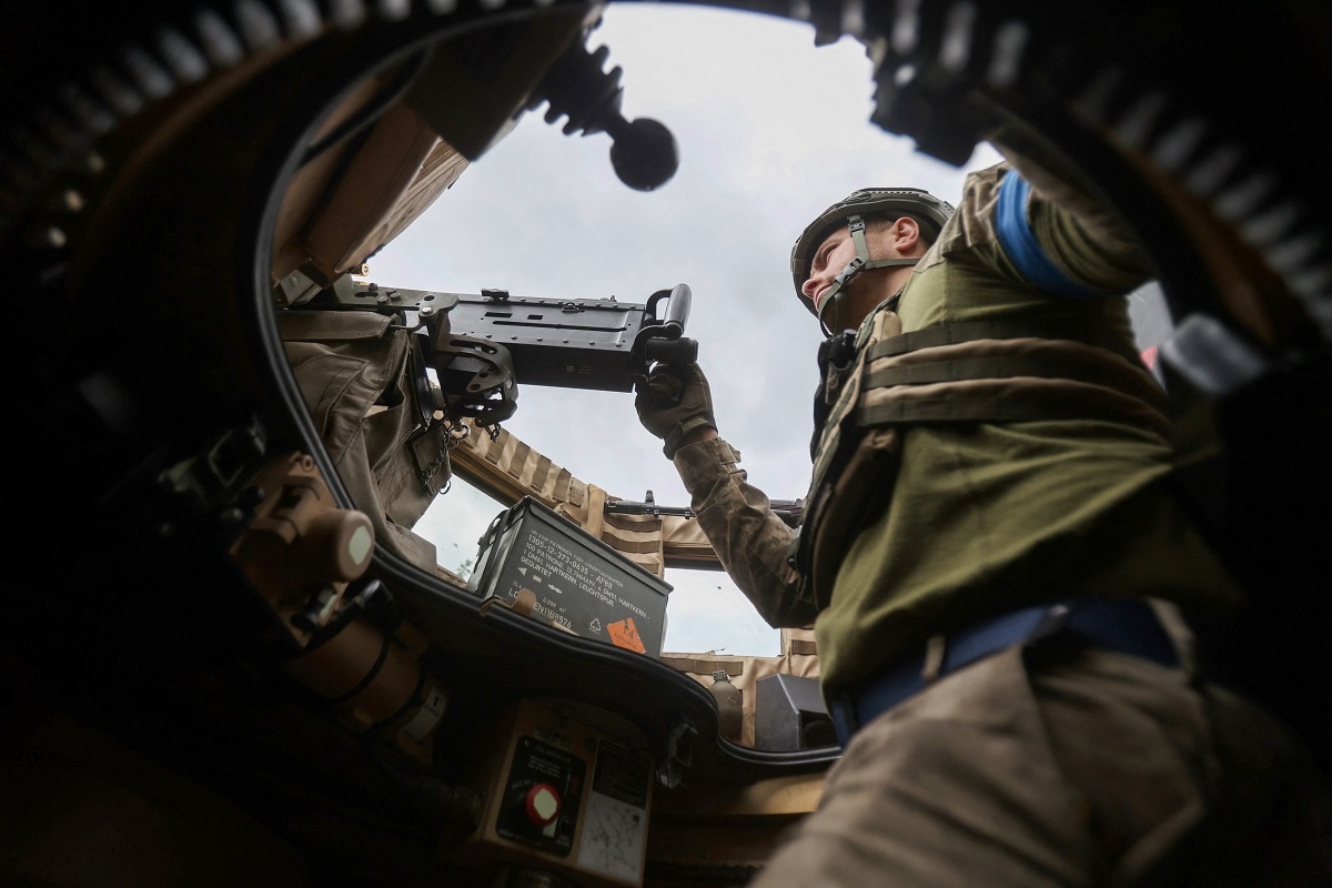 TOPSHOT - A Ukrainian serviceman mans a machine gun as he rides on a MaxxPro MRAP in the recently liberated village of Blagodatne, Donetsk region on June 16, 2023, amid the Russian invasion of Ukraine. Kyiv's forces are pushing onwards, and even the Russian army confirms that its positions in Urozhaine, another two kilometres south of Blagodatne, have come under attack. The push south in this valley is led by the experienced 68th Jaeger (Hunter) Brigade, and is the most concrete sign of Ukrainian progress since the wider offensive began. (Photo by Anatolii Stepanov / AFP) (Photo by ANATOLII STEPANOV/AFP via Getty Images)