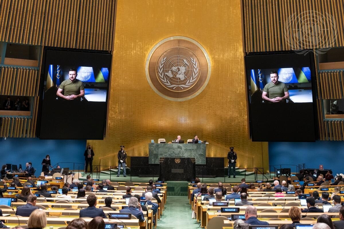 Ukraine President Volodymyr Zelenskyy (on screens) addresses the General Debate of the UN General Assembly’s 77th session on 21 September 2022 (Image courtesy United Nations)