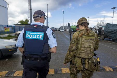 Solomon Islands: cops bearing gifts