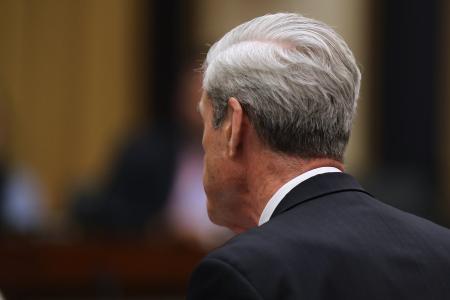Bob Mueller exits the stage
